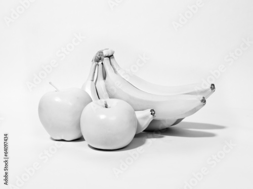 White Fruits on White, two apples and a bunch of bananas are all white against a white background.