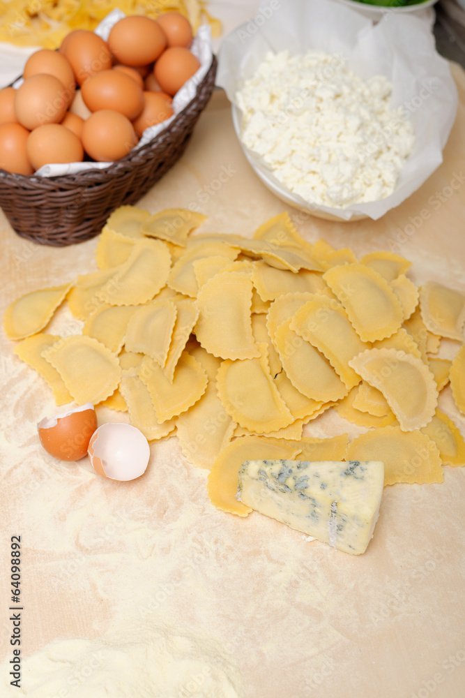 Making home made ravioli with cheese and ricotta filling Making home made ravioli with cheese and ricotta filling