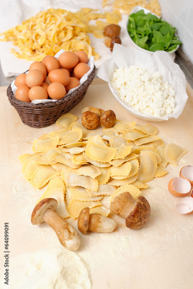 Making home made ravioli with porcini mushroomsh and ricotta Making home made ravioli with porcini mushroomsh and ricotta