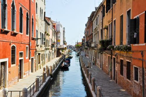 Narrow Venetian canal in Venice, Italy. © lornet