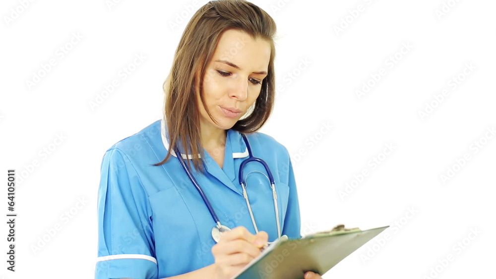 Female doctor writing notes on clipboard, isolated on white Female doctor writing notes on clipboard, isolated on white