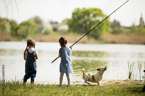Two little girls fishing