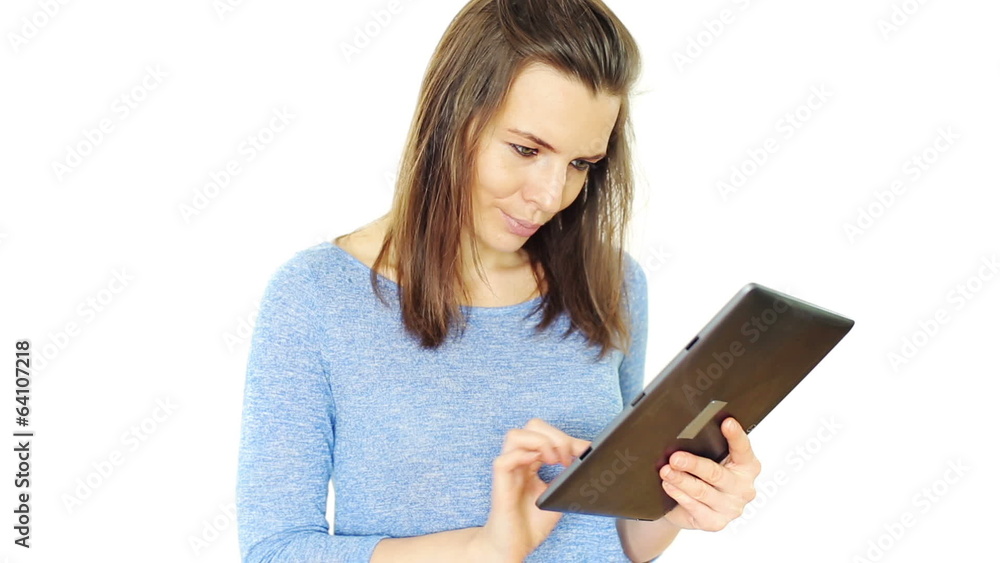 Young attractive woman using modern tablet computer Young attractive woman using modern tablet computer