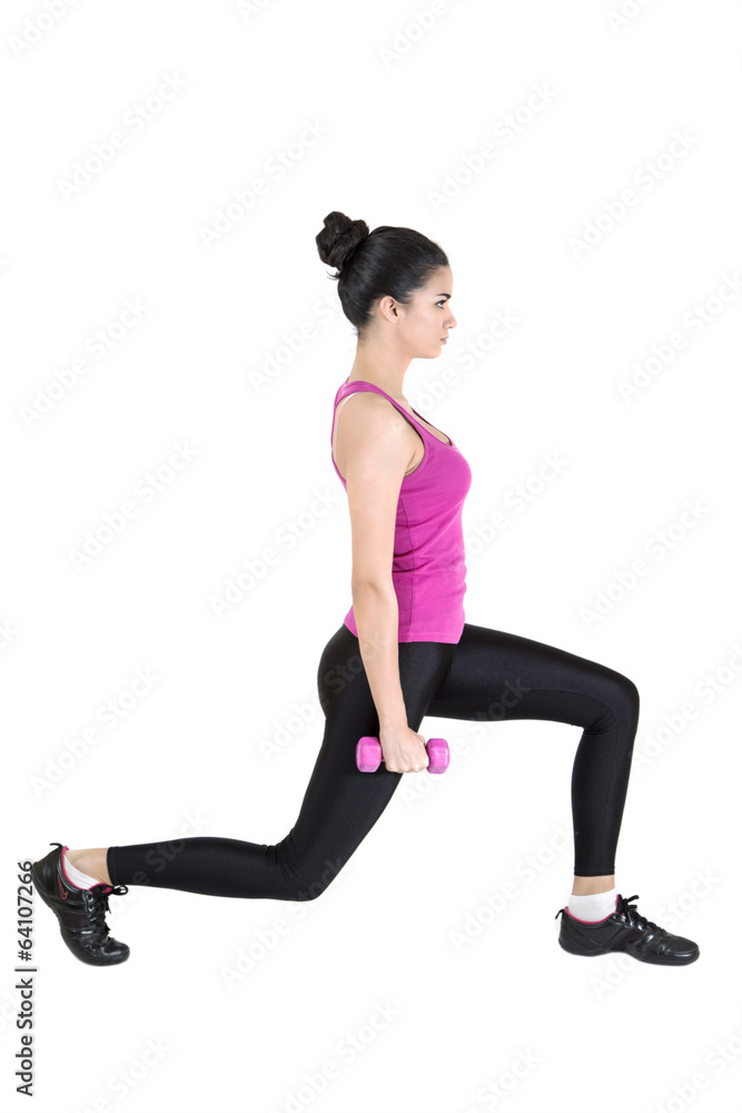 Pretty young woman training with dumbbels Pretty young woman training with dumbbels