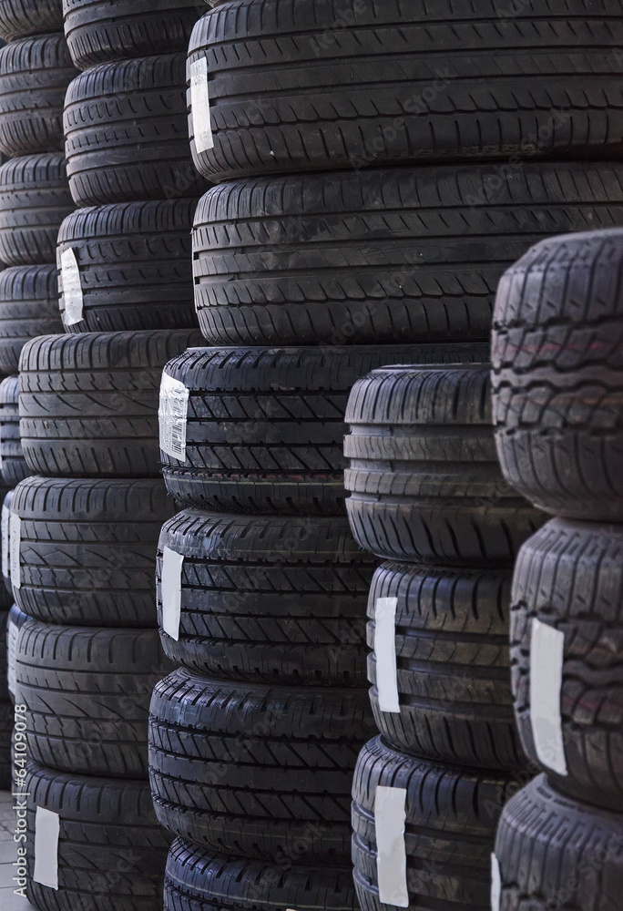 Used old car tires at workshop. Used old car tires at workshop.
