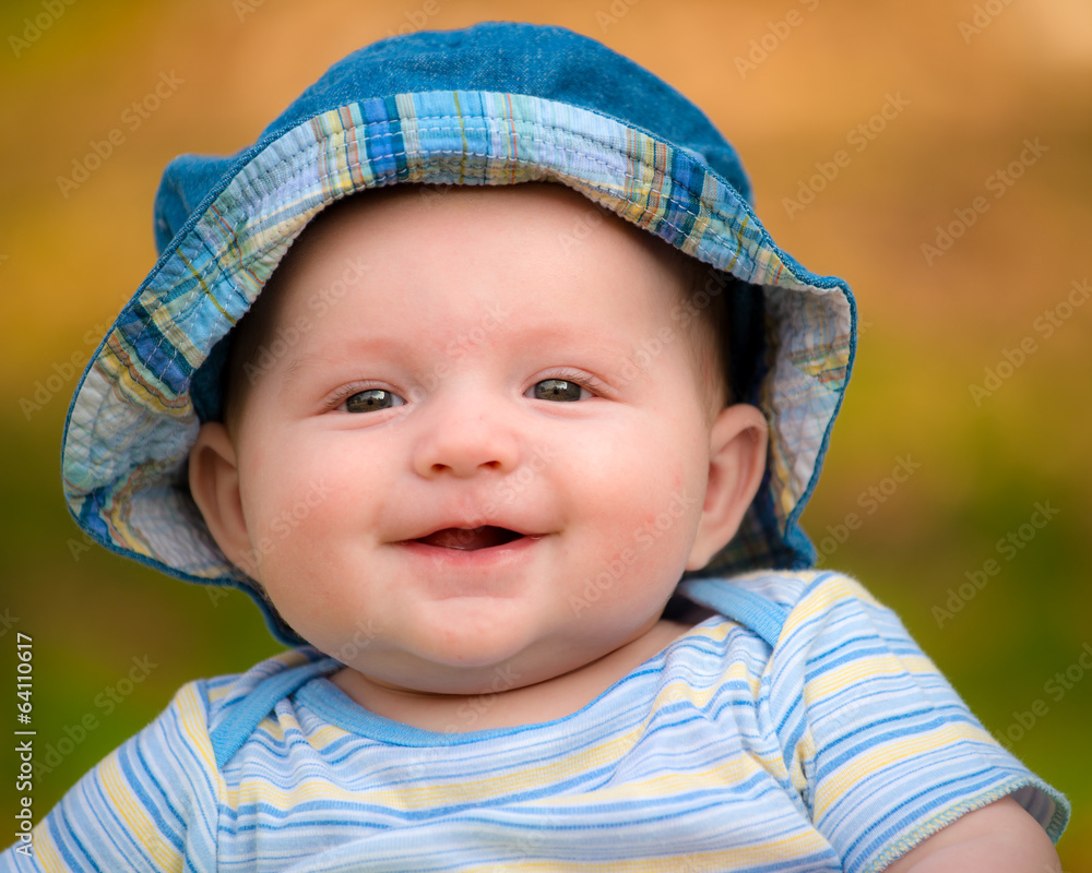 Outdoor portrait of happy smiling infant baby boy Outdoor portrait of happy smiling infant baby boy