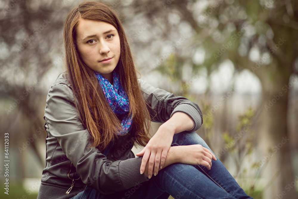 Attractive young girl enjoying a quiet moment Attractive young girl enjoying a quiet moment