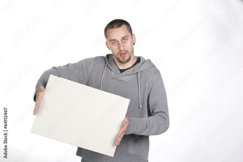Young man holding a blank board on white background Young man holding a blank board on white background