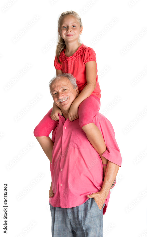 Little girl enjoying piggyback ride with her grandfather Little girl enjoying piggyback ride with her grandfather