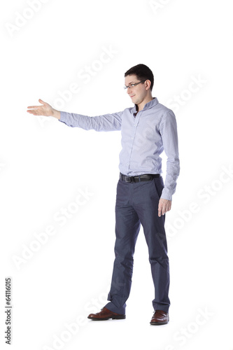man stands in full growth points to the left on a white