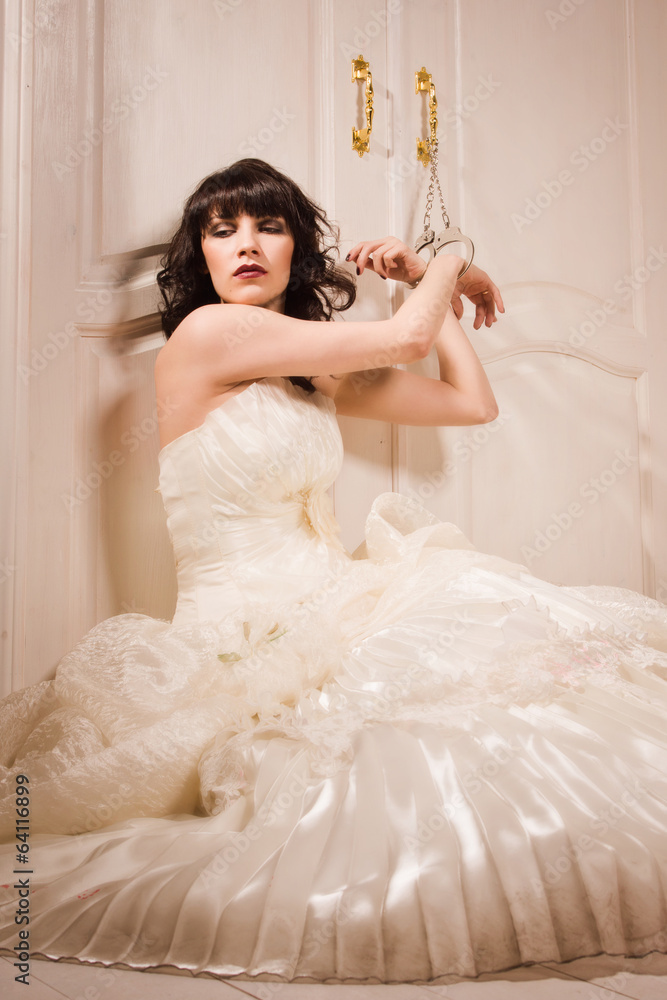 Fototapeta premium Bride in handcuffs