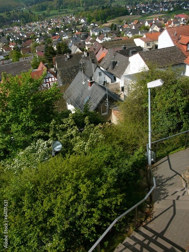 Fußweg zur Ruine der Burg Vetzberg bei Sonnenschein mit Blick auf das Dorf bei Rodheim-Bieber in der Gemeinde Biebertal im Kreis Gießen in Hessen photo