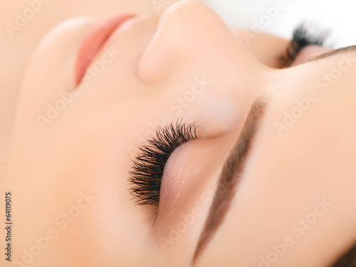 Fotografie Woman Eye with Long Eyelashes. Eyelash Extension