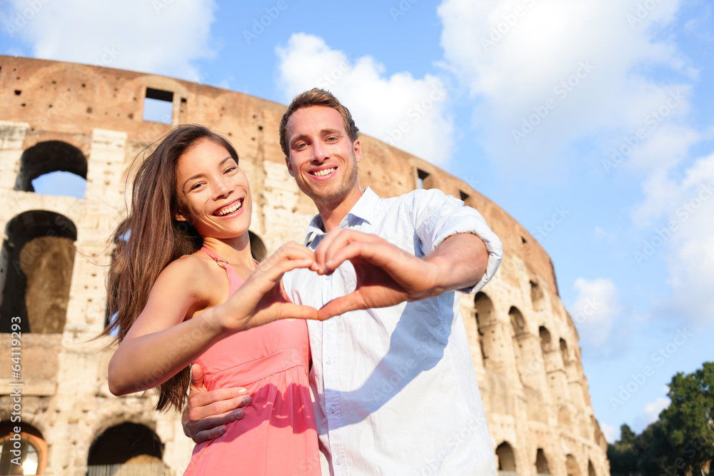 Romantic travel couple in Rome by Colosseum, Italy