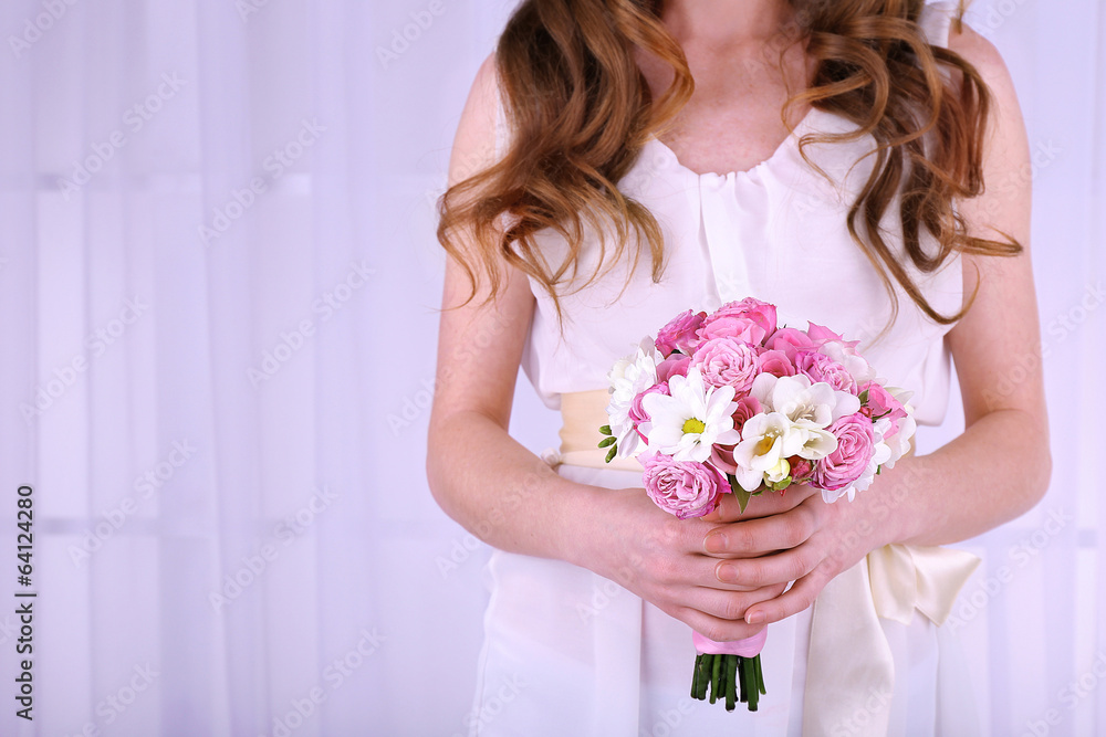 Woman hands holding beautiful wedding bouquet Woman hands holding beautiful wedding bouquet