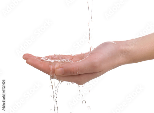 Human hand with water splashing on them isolated on white