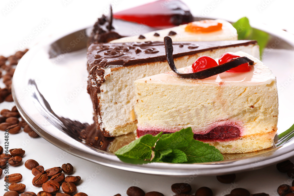 Assortment of pieces of cake, close up Assortment of pieces of cake, close up