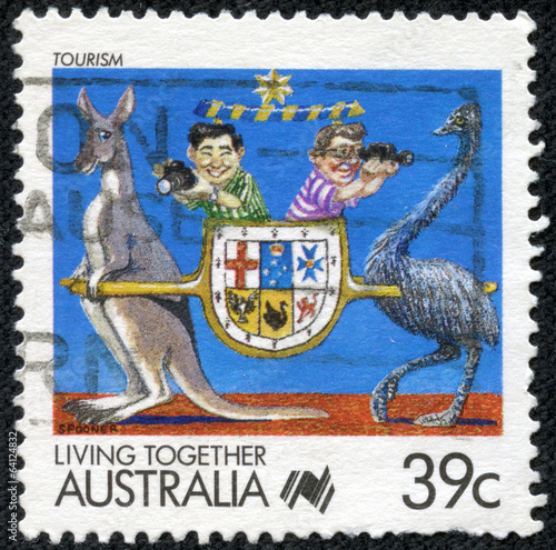 stamp printed in the Australia shows Tourism, Living Together photo