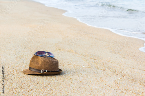 Woven hat with sunglasses.