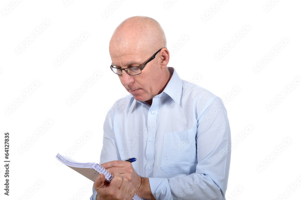 Man standing with a notepad Man standing with a notepad