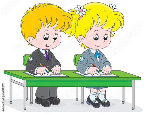 Schoolgirl and schoolboy write in exercise books