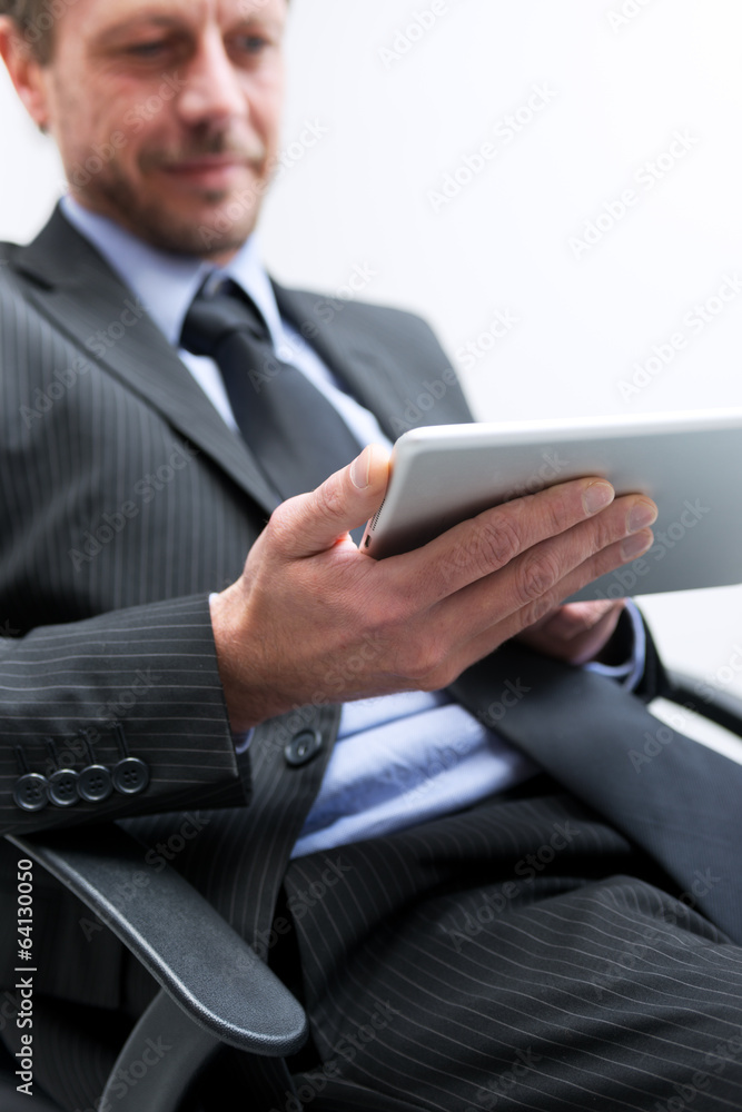 Businessman working with tablet Businessman working with tablet
