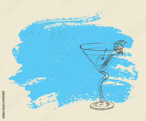 Tropical cocktail with mint on blue grunge background