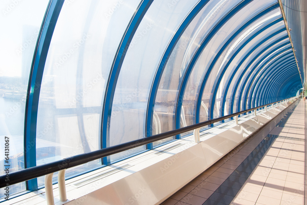 Fototapeta premium Glazed corridor in office center