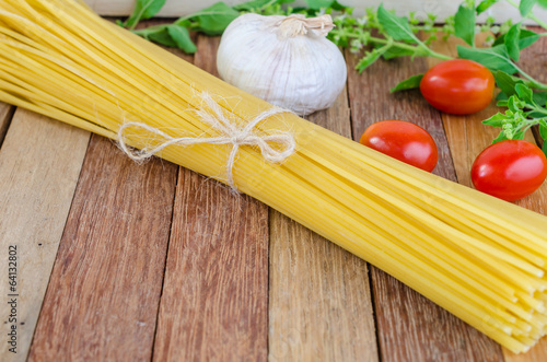 Spaghetti and tomatoes with herb