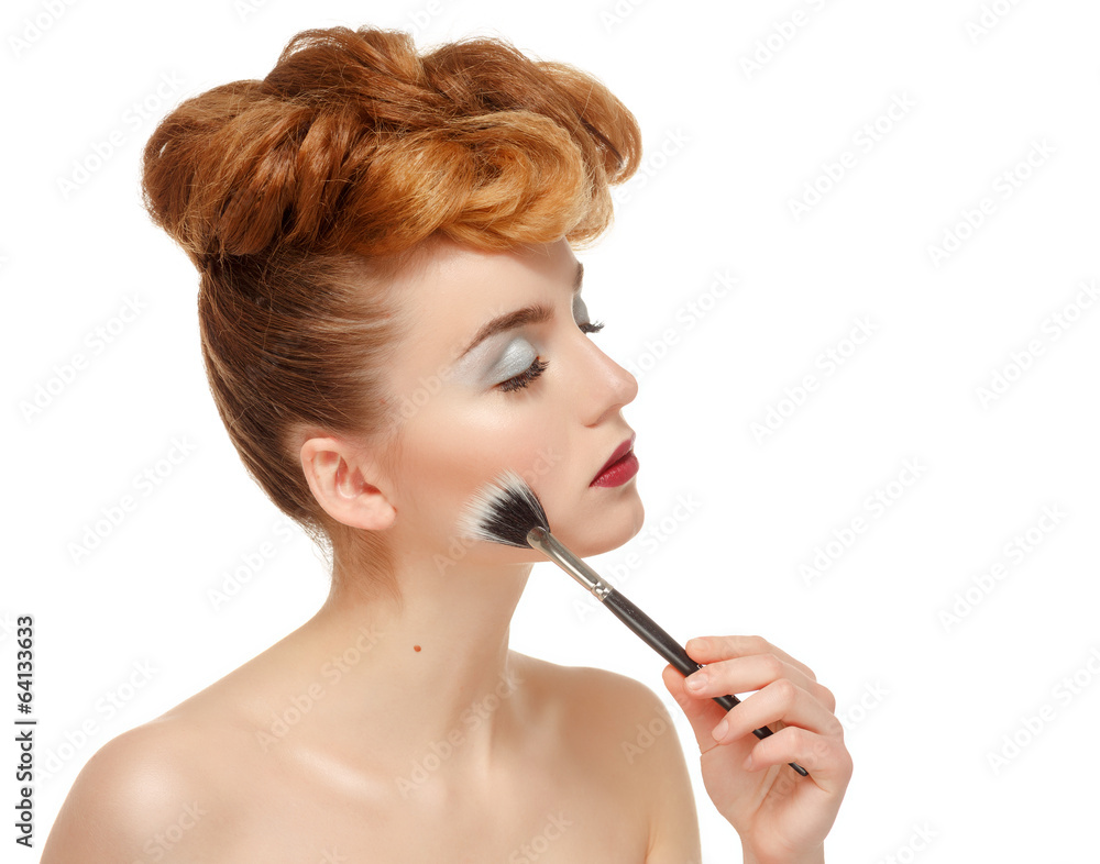 Beauty portrait of pretty woman with brush for makeup Beauty portrait of pretty woman with brush for makeup