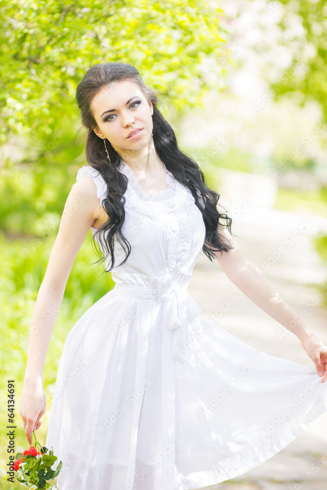 Beautiful young brunette posing in nature Beautiful young brunette posing in nature