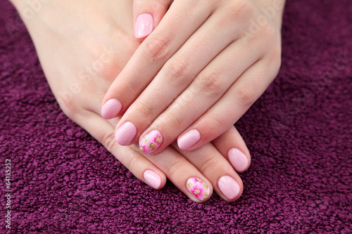 Beauty treatment  hands with painted fingernails
