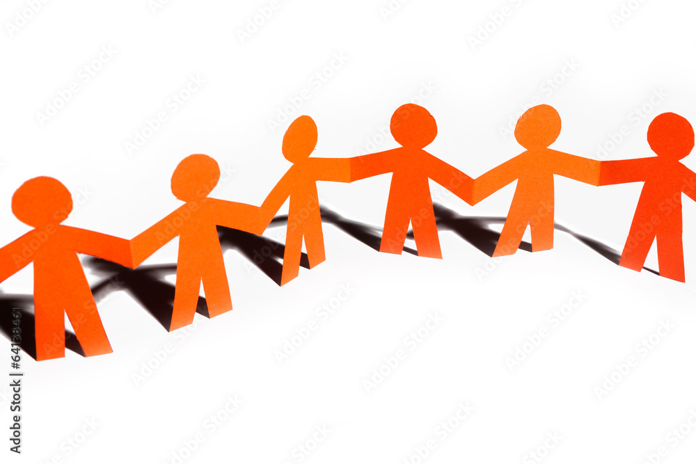 Paper team linked together partnership concept Paper team linked together partnership concept