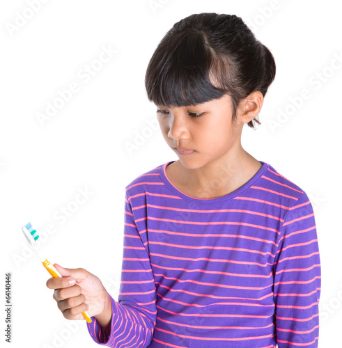 Young Girl With Toothbrush