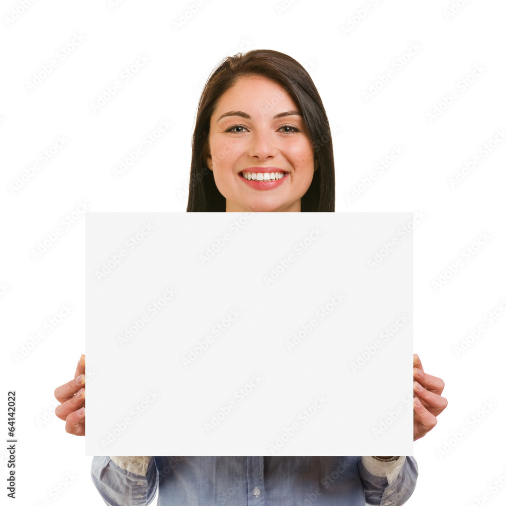 Isolated smiling young woman showing blank signboard Isolated smiling young woman showing blank signboard