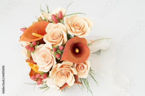Fototapeta Naklejka Na Ścianę i Meble -  Colorful bouquet of orange calla lilies