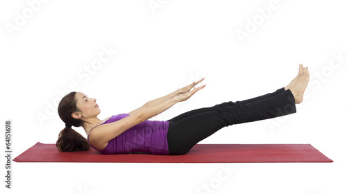 Young woman doing abs workout