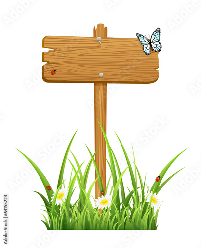 Wooden sign in grass