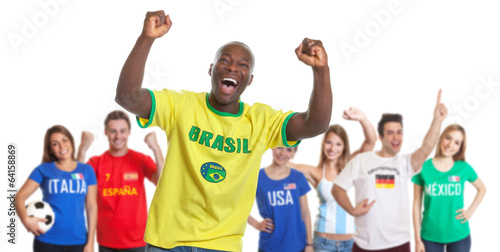 Cheering sports fan from Brazil with fans from other countries © Daniel Ernst