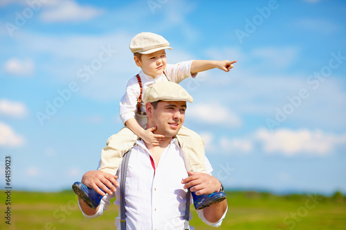 portrait of father and son in the countryside