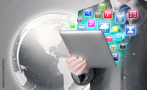 Business man use tablet pc with colorful application icons