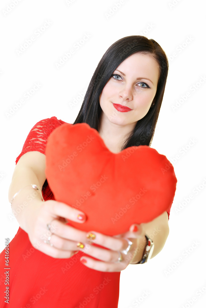 Attractive young woman red heart-shaped pillow.