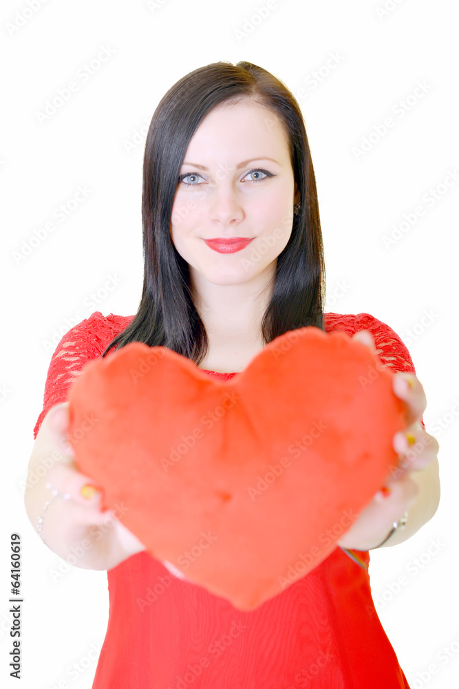Attractive young woman red heart-shaped pillow. Attractive young woman red heart-shaped pillow.