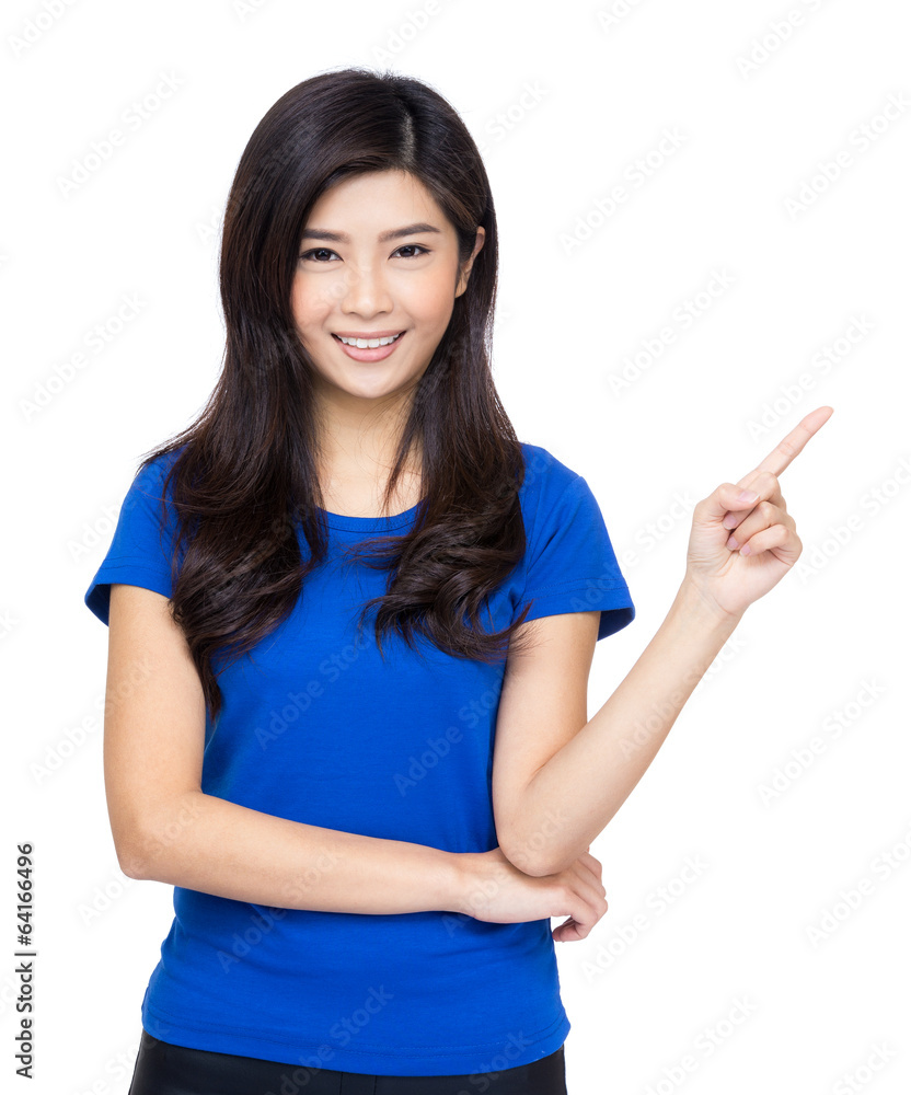 Woman smiling pointing up