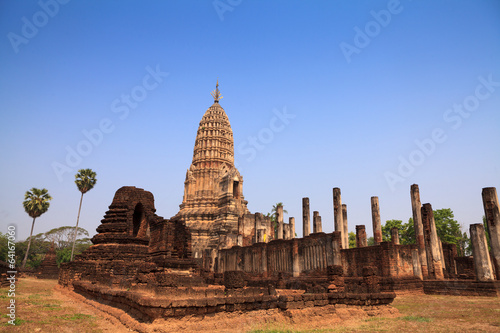 Sukhothai ruin old pagoda against blue sky