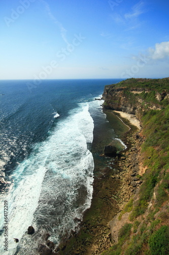 Cliff side sea ocean blue sky rock