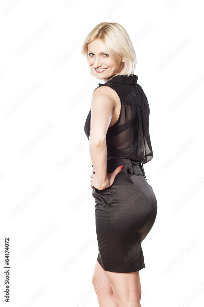 short haired blonde in a black dress posing on white short haired blonde in a black dress posing on white