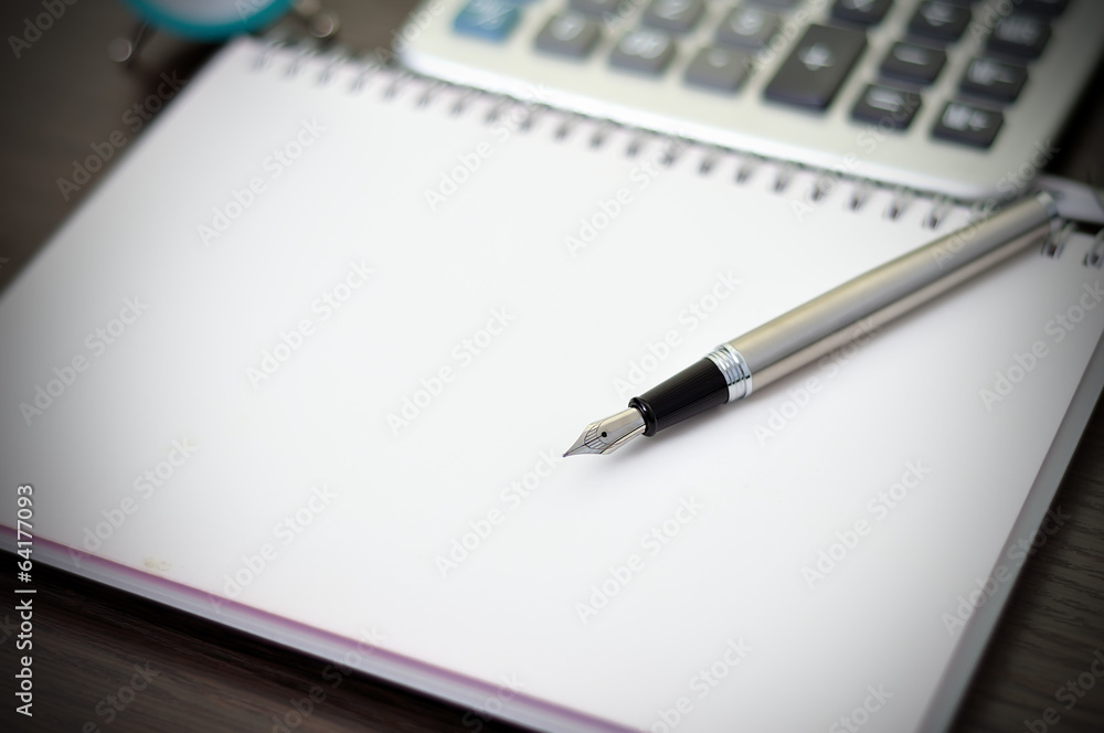 Fountain pen on notebook Fountain pen on notebook