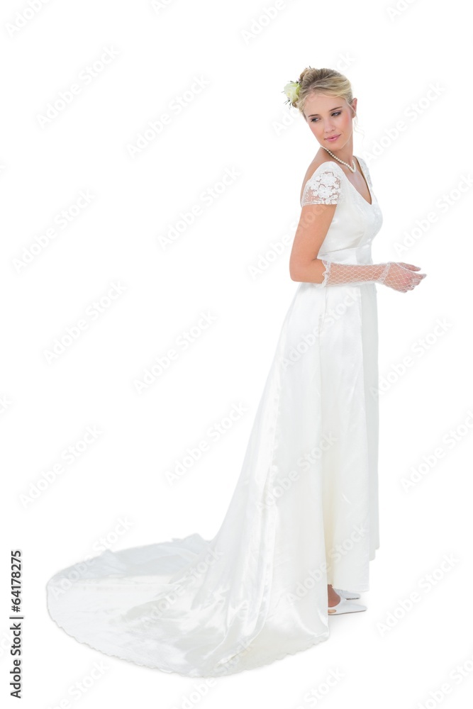 Thoughtful bride looking over shoulder Thoughtful bride looking over shoulder