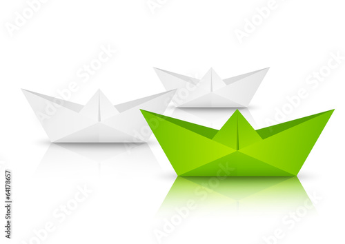 Paper origami ships on white